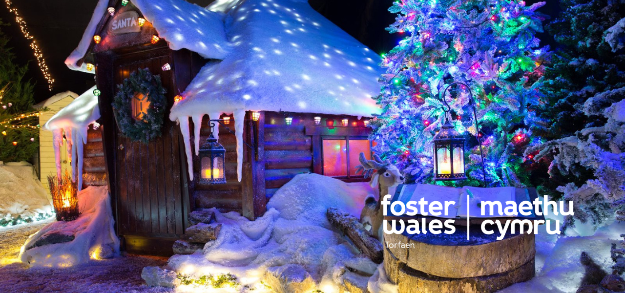 foster wales hero image of christmas hut decorated with snow